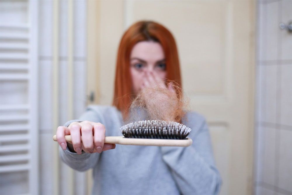 How Much Hair Shedding Is Normal: Can it be Slowed or Stopped?